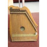 Musical Instruments: A chromatic piano harp by The South Western Novelty Co.