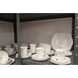 20th cent. Ceramics: Shelley dainty white tea and coffee set comprises: bread and butter plate, 6