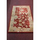 Rugs: Chinese washed pale blue & ivory ground rug with floral pattern 47ins. x 83ins. includes