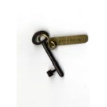 R.M.S. TITANIC: Extremely rare key with brass tag bearing the words "Chart Room" owned by Samuel