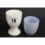 MILITARIA/THIRD REICH: Kriegsmarine ceramic egg cups, marked with eagle and swastika and M. 1 x 2ins