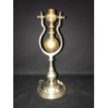 WHITE STAR LINE: A good silver-plated gimbal lamp with engraved house flag to base. 11½ins.