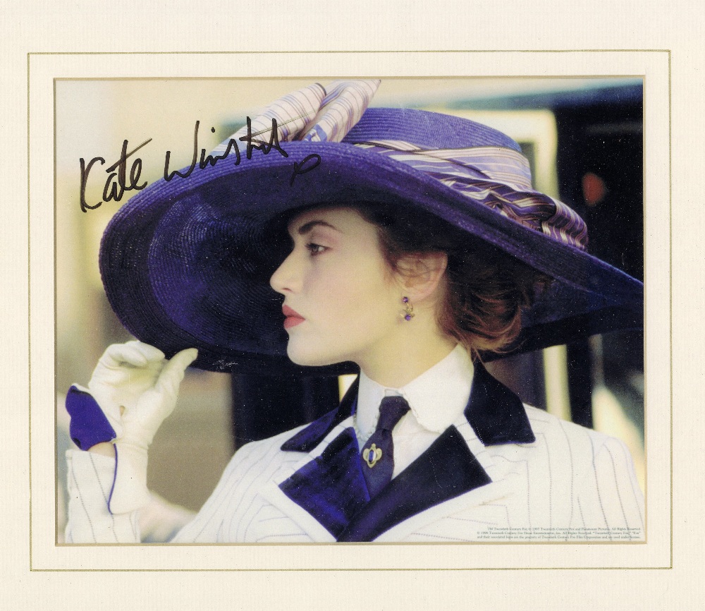 TITANIC/MOVIE MEMORABILIA: Kate Winslet signed photo of Rose in her boarding costume. Framed and