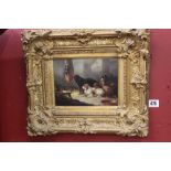 20th cent. English School: Oil on board "St Bernard Dogs in a Stable" ornate gilt frame, 7½ins. x