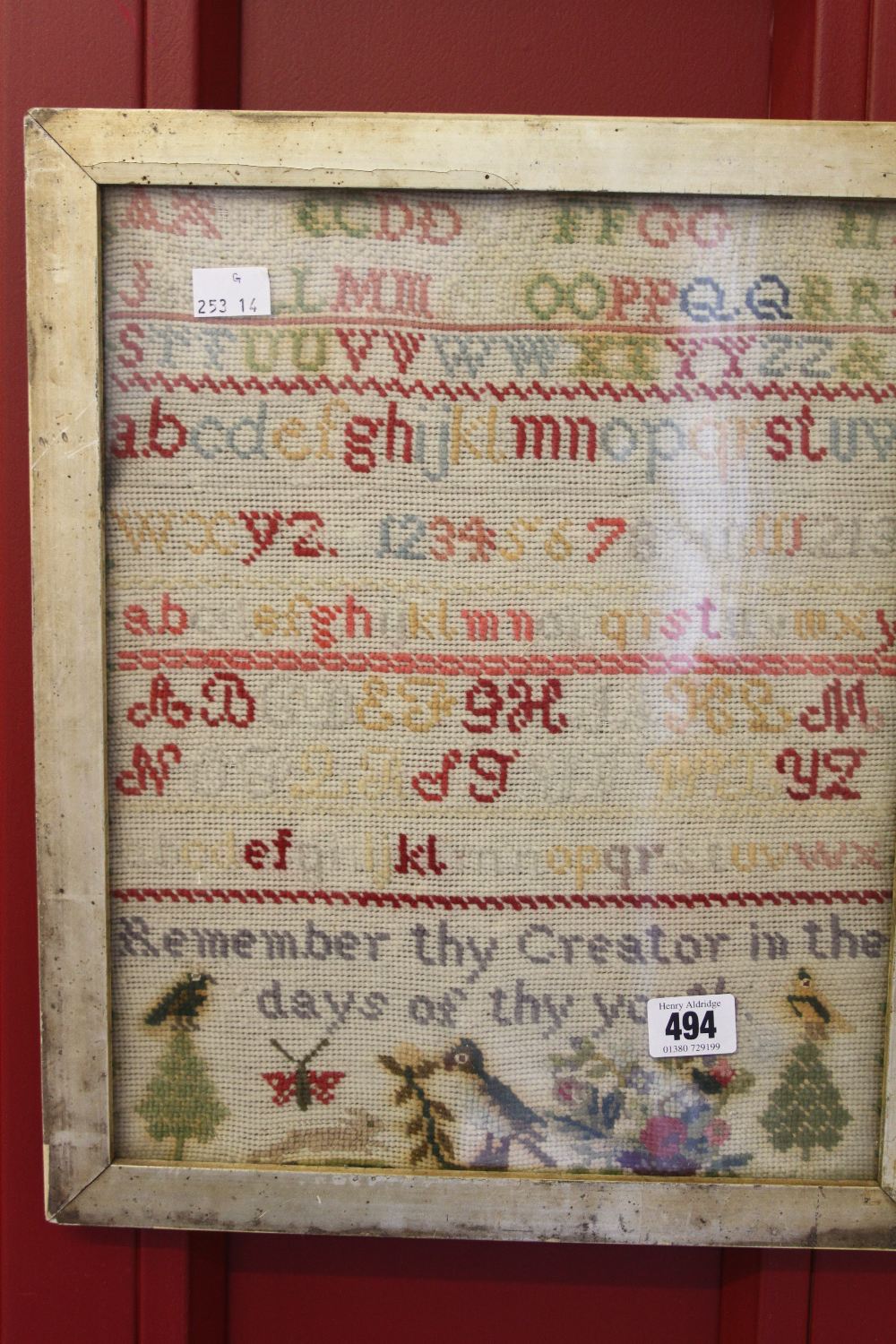 Early 19th cent. Sampler with alphabet and biblical verse, framed and glazed, 11ins. x 14ins.