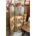 Early 20th cent. four section mahogany screen, part glazed with fabric bottom section.