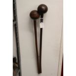19th cent. Zulu Weapons: Knobkierrie 25ins. long, a pair. Given to the owner by a relative who