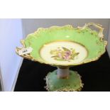 19th cent. Ceramics: Coalport "Tazza" green ground, gilt border decoration central study of