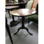 19th cent. Mahogany occasional table on single column and three splayed supports. 24ins.