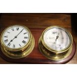 Clocks: 20th cent. Brass cased Bulkhead style clock and barometer Taylor of England mounted on a