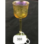 20th cent. Art Glass: Tiffany amber lustre liqueur glass decorated with vine leaf borders. Signed to