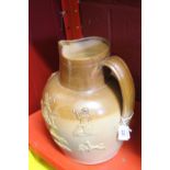 20th cent. Ceramics: Doulton Lambeth harvest jug with rural motifs in relief. 11ins. tall.
