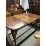 19th cent. Mahogany wind out table, one leaf, serpentine supports rising off pad feet. 58ins x 28ins