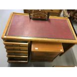 20th cent. Oak single pedestal 5 drawer desk with replacement skiver and a small 3 drawer stag