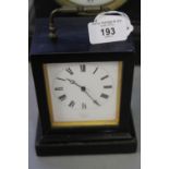 Clocks: 20th cent. French ebonised wooden cased carriage clock, enamelled face, Roman numerals. Back