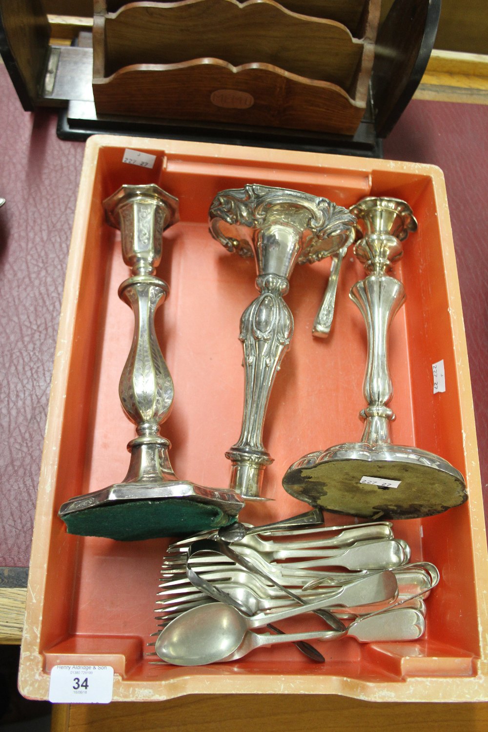 Plated Ware: Quantity of flatware & three ornate candlesticks.