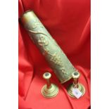 Trench art large shell case vase in an oriental style. 15½ins. Two candlesticks 4½ins.