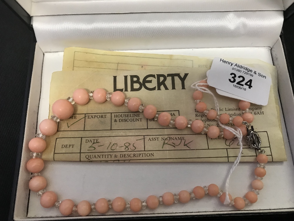 Liberty: Pink coral graduated necklace with crystal spacers, diamond & white gold clasp with