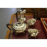 Plated Ware: Tea set comprised of hot water pot, teapot, sugar bowl, and a milk jug (4).