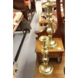 19th cent. Brass candlesticks turned with octagonal bases - a pair. 14ins.