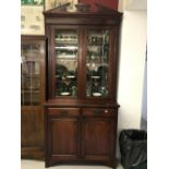 19th cent. Mahogany bookcase cupboard. 43ins. x 90ins. x 17ins.