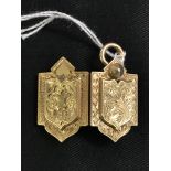 19th cent. Yellow Metal Jewellery: Gothic style floral engraved locket, opens to reveal 2 oval