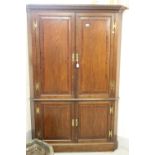 19th cent. Oak 2 piece corner cupboard, both with twin doors shaped shelves 50ins. width x 26ins.