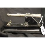 Desk Furniture: Maltese model fortress cannon, Maltese silver with cast bands around the barrel,