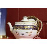 19th cent. Ceramics: Spode blue and gilt tea pot on stand pattern No. 492 small crack to base.