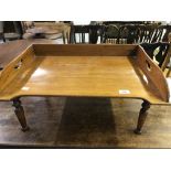 Late 19th cent. Mahogany lap tray with four tapering supports.