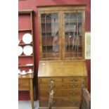 19th cent. Mahogany bureau bookcase with glazed top section, fitted interior above two short and
