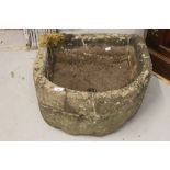 19th cent. Gardenalia carved stone trough semi circular design 22ins. x 21ins.