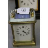 Clocks: 20th cent. Carriage clock, French, enamelled face & Roman numerals. 4¼ins. x 2ins. x 3ins.