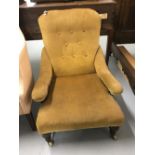 19th cent. Upholstered button back nursing chair, turned front supports on four ceramic castors.