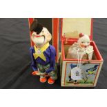 Toys: 20th cent. Post 1946 clockwork balancing clown with 'original' box plus a bisque headed "