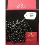 Costume Jewellery: Pia grey/black simulated pearl necklace, 34ins. boxed.