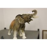 20th cent. Ceramics: A Royal Dux elephant 13¼ins. x 20ins.