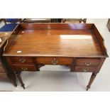19th cent. mahogany ladies desk 5 drawers, 4 turned supports, solid gallery to back and sides 42ins.