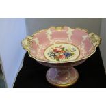 19th cent. Ceramics: Coalport "Tazza" pink ground embossed gilt releaf, hand painted central