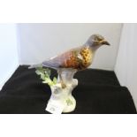 19th/20th cent. European Ceramics: Meissen figure of a field fare bird perched on a tree stump,