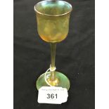 20th cent. Art Glass: Tiffany amber lustre liqueur glass decorated with vine leaf borders. Signed to