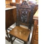 19th cent. Mahogany hall chair with deep carved back of acanthus leaves & floral decoration.