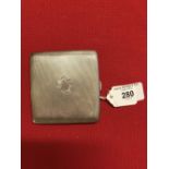 Hallmarked Silver: Cigarette case with Military style badge carved on the case 2½oz.