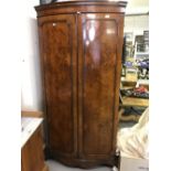 19th cent. Burr walnut twin door, bow fronted, wardrobe. 37ins. x 75ins. 25ins.
