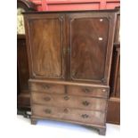 19th cent. Mahogany linen press converted to a wardrobe with 2 long drawers beneath, on bracket