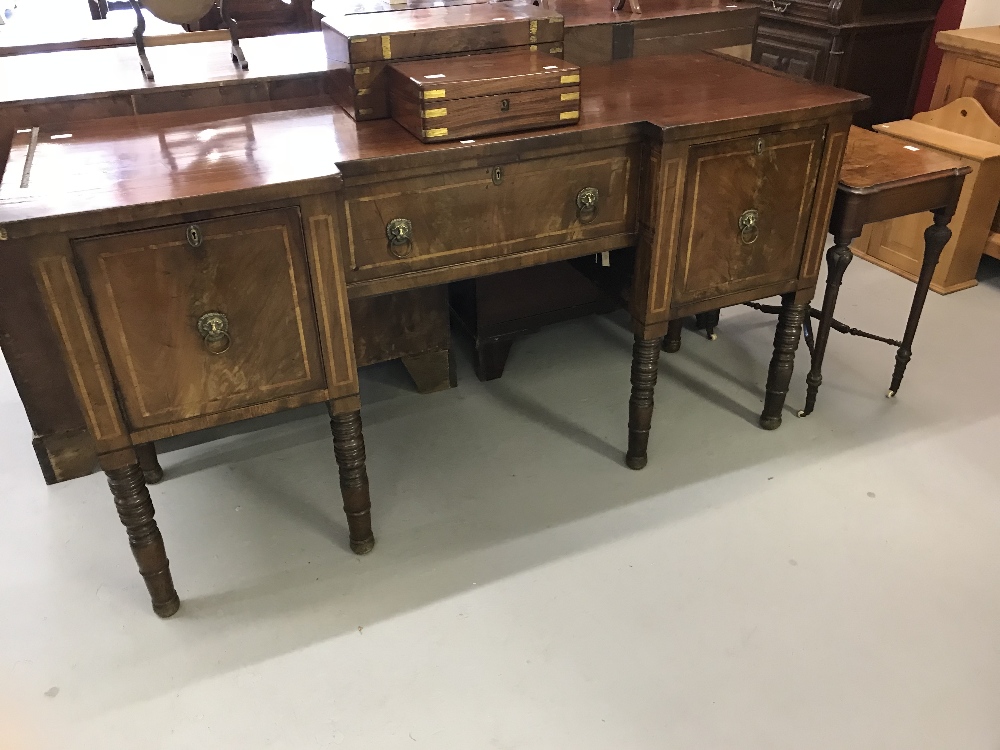 19th cent. Mahogany breakfront dresser base, single drawer flanked by 2 cupboards on turned