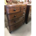 19th cent. Mahogany bow front 2/3 chest of drawers with cock beading to drawer fronts, on turned