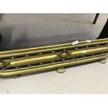 Brass and ornate fireside fender. 41ins. x 9½ins. x 11ins.