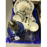 19th cent. Oil Lamp: Cast iron base, blue glass reservoir and flu 20ins. Royal Doulton teaset '