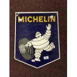 Enamel sign embossed Michelin shield shape. 17½ins. x 14½ins.